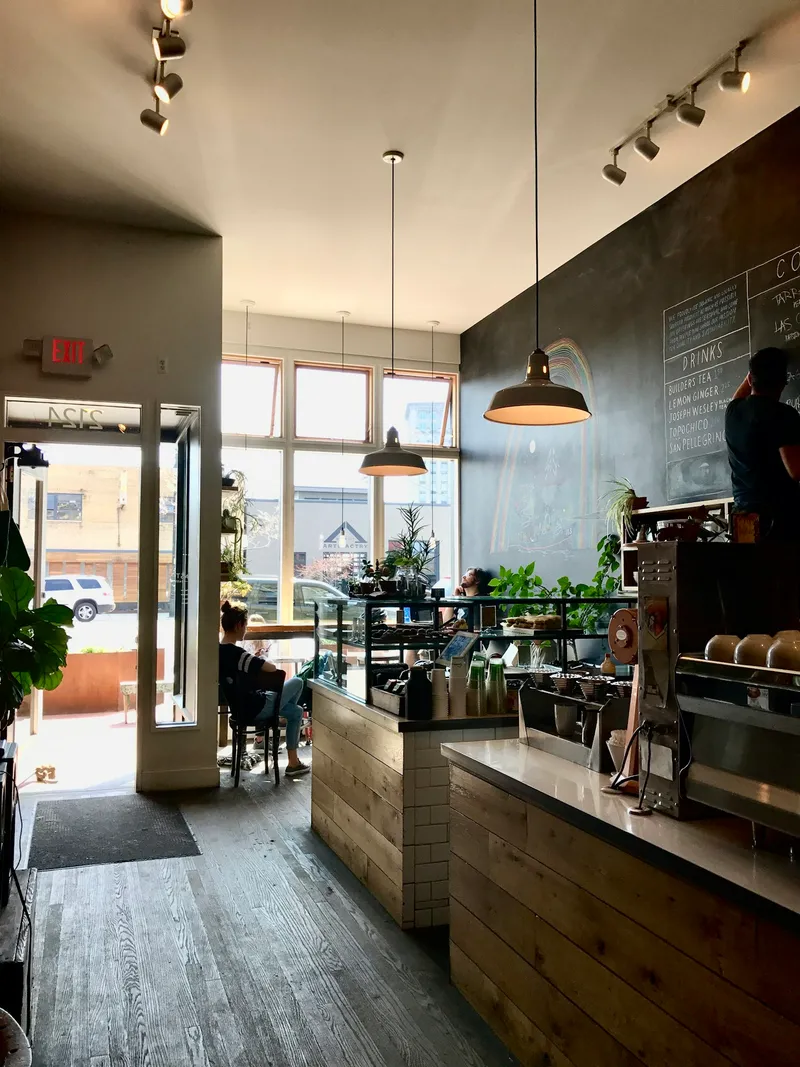 A window seat overlooking a quiet street outside Dreamlight Cafe